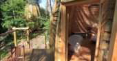Looking inside the bedroom area from the balcony at River Treehouse, Cap Cabane, Gironde, France