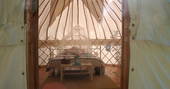 Double bed interior at Cherry Blossom Yurt, Haute-Loire