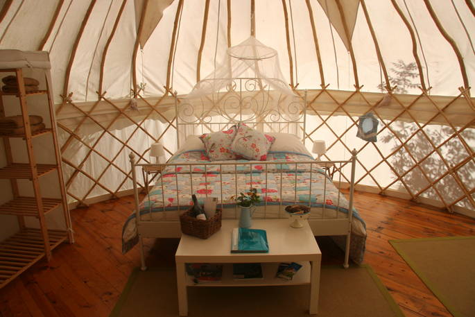 Bedroom suite interior at Cherry Blossom Yurt, Haute-Loire