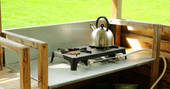 Two gas ring hob in the kitchen facilities next to the bell tent at Atoll