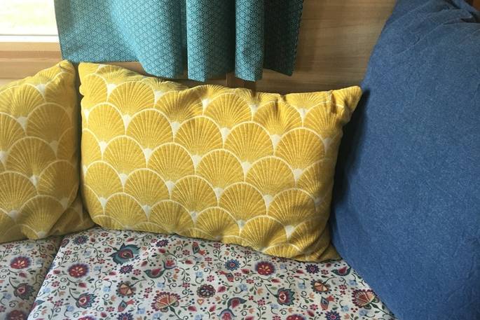 Close up of the seating area inside the cabin at Bot-Conan Lodge in France