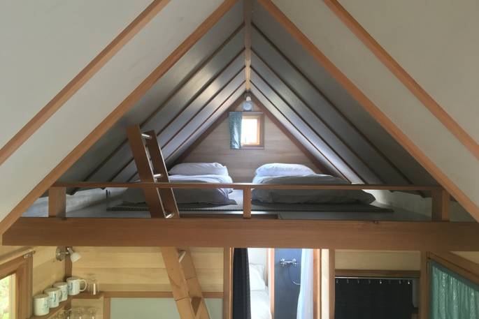 Two single beds on mezzanine level at La Cabane de Bot-Conan in France