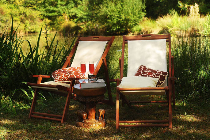 garden chairs lake glamping france