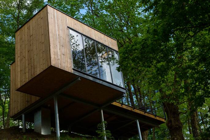 Exterior of Cabane de Salagnac Cèdre Blanc Tree Cabin in the trees, Corrèze, France