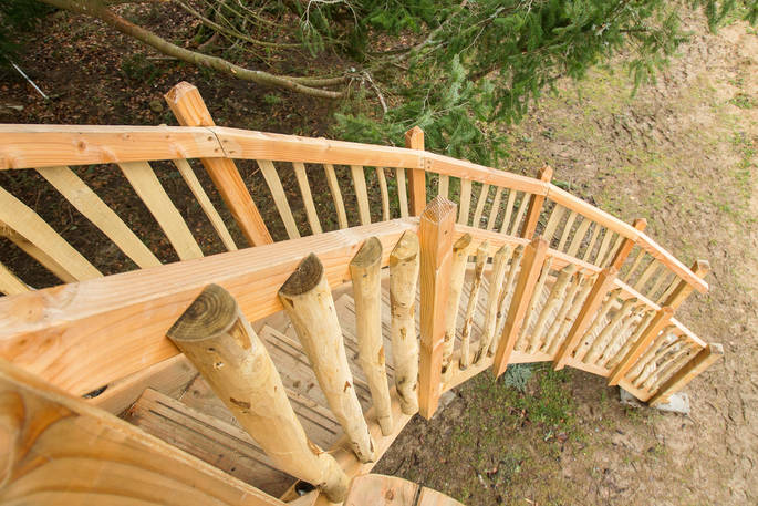 Handcrafted stairway leading up to your treehouse castle at Château de Memanat in France