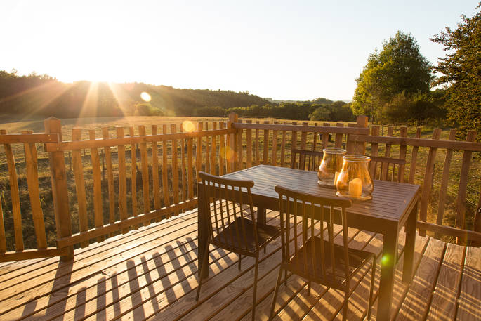 Light the candles on the elevated terrace of Sommet de Memanat treehouse and relax, with countryside view