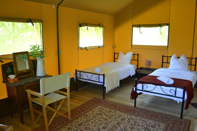 Inside of Meru, childrens single beds at Le Camp in France 