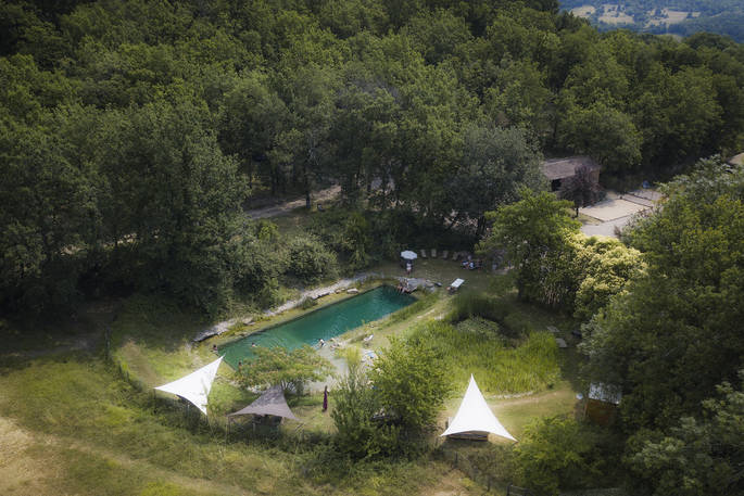 Outdoor arial view of the shared swimming pool at Le Camp in France