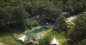 Outdoor arial view of the shared swimming pool at Le Camp in France