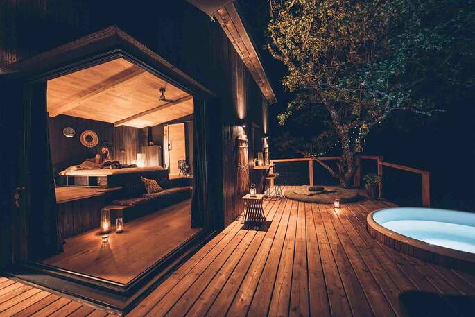 Terrace showing open plan layout inside the cabin - Credit - @bestjobers