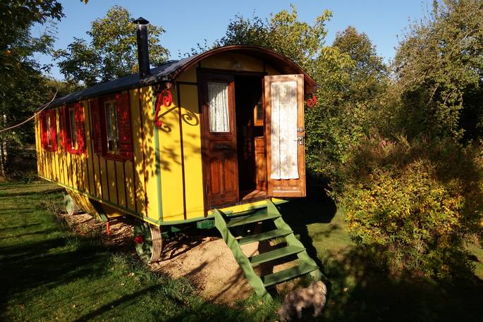 Exterior view of the quirky and colourful Fairground Roulotte at La Serve in France