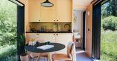 Open plan kitchen and dining table for two