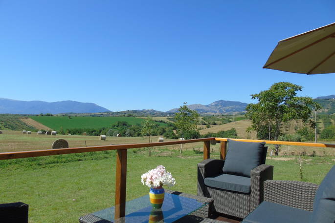 hawkridge glamping italy pescara outside seating view with ard mountain view