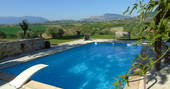 The private outdoor swimming pool at The Pool House with stunning mountain views and Abruzzo countryside 
