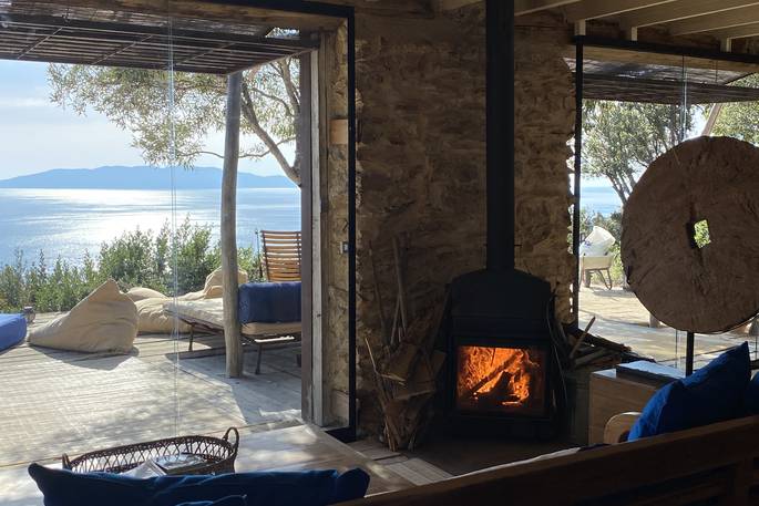 La Casetta Sul Mare cabin interior with wood burner, Grosseto, Tuscany, Italy