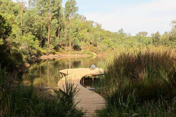 Outdoor decking leading out onto the beautiful lake at A Terra
