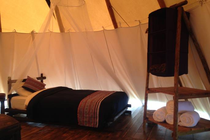 Pretty interiors and comfortable beds in Sunshine Tipi