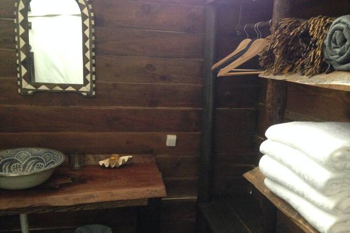 Fluffy white towels in the bathroom at A Terra