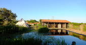 Exterior view of bell tent and Casa do Lago, Chalet in Baixo Alentejo