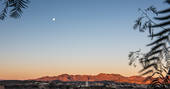 Old moon and mountains at dawn, Casa Isadora Cave House, Almeria, Spain
