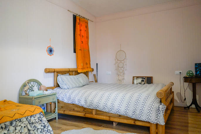 Bedroom with quirky decor and comfortable double bed at Magic HQ in Cadiz, Spain