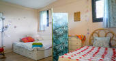 Quirky and colourful bedroom at Magic HQ in Cadiz, Spain